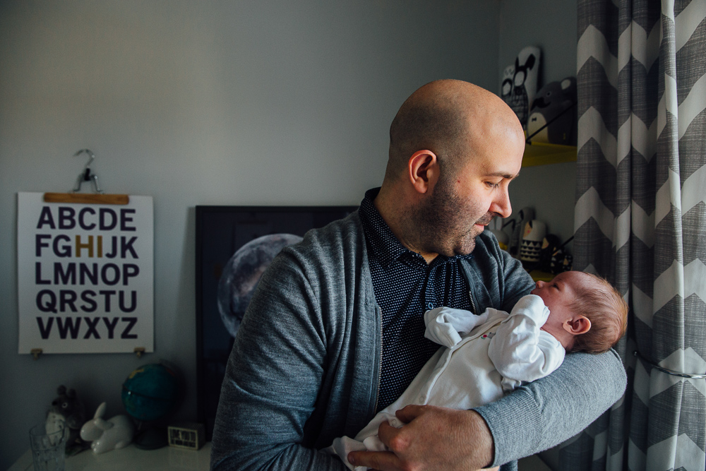 PARENTS WITH NEWBORN BABY IN NURSERY FAMILY PHOTOGRAPHER KENT