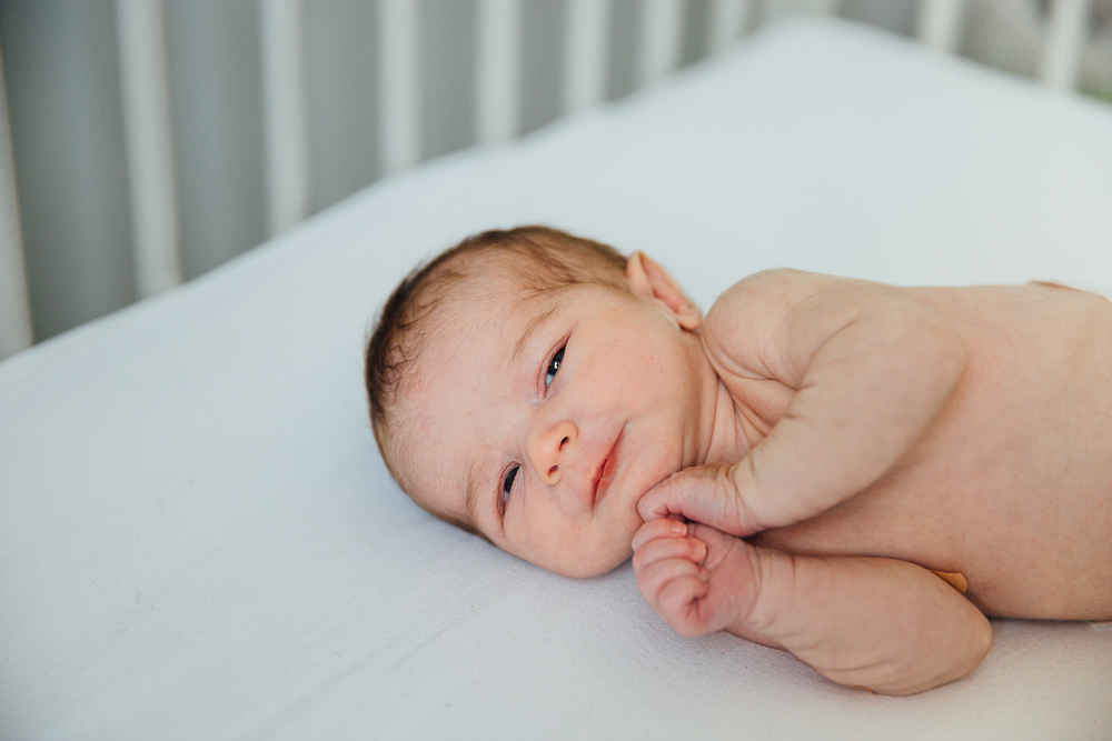 NEWBORN BABY GIRL IN COT, KENT PHOTOGRAPHER