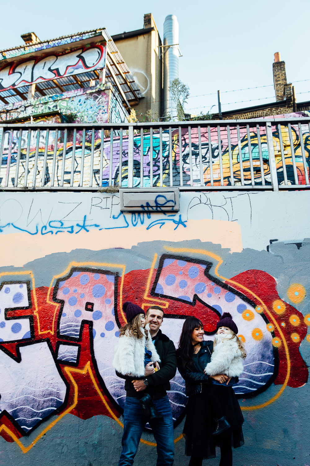 alternative london family photographer leake street graffiti wall portrait